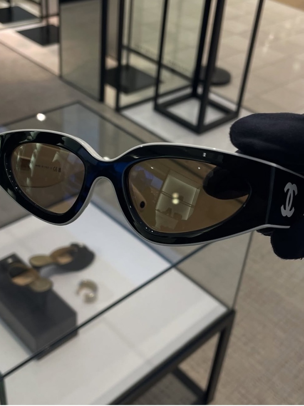 CHANEL Black Frame Sunglasses with Brown Lenses